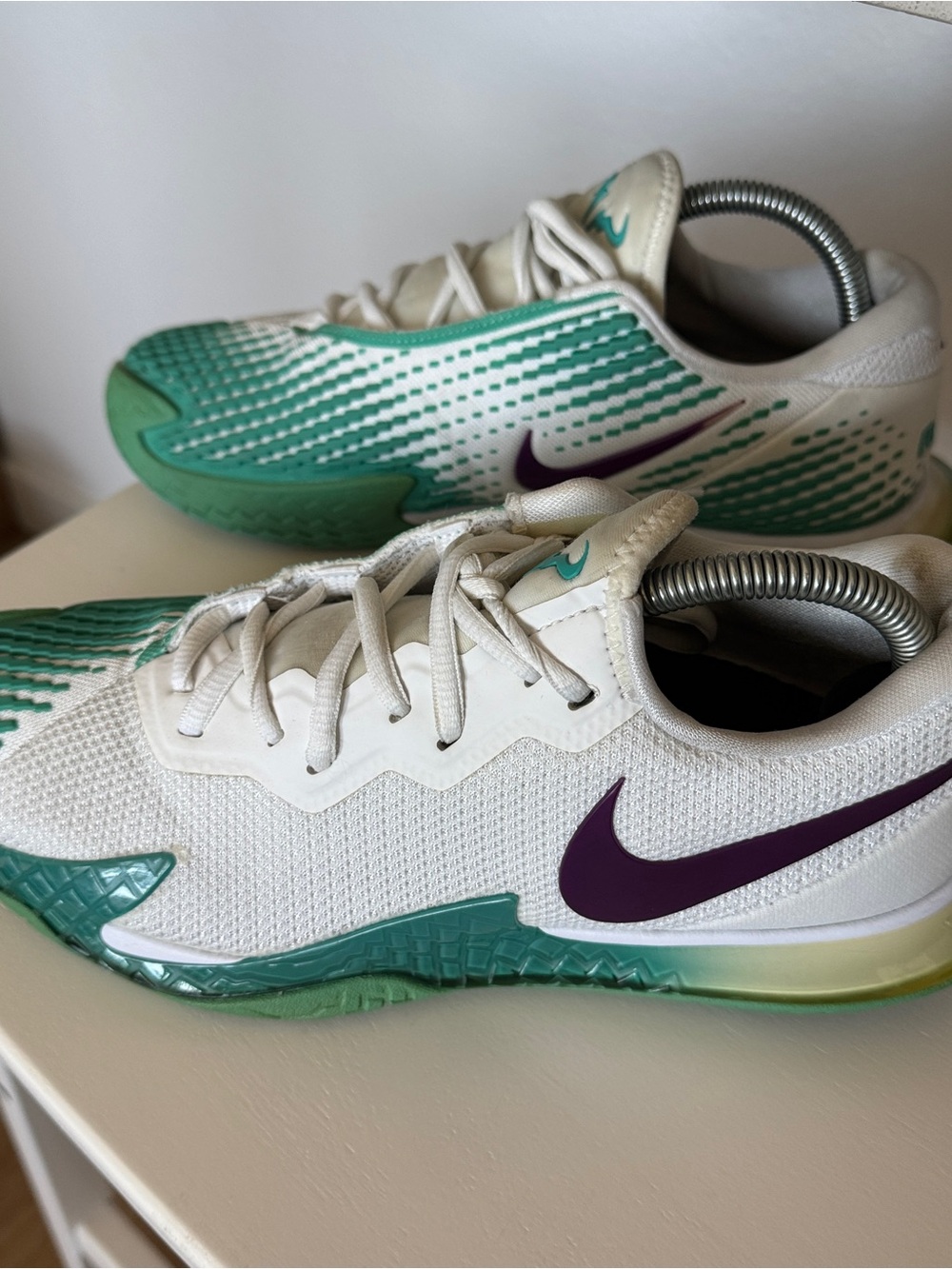 Nike White Athletic Shoes with Teal Accents and Purple Swoosh